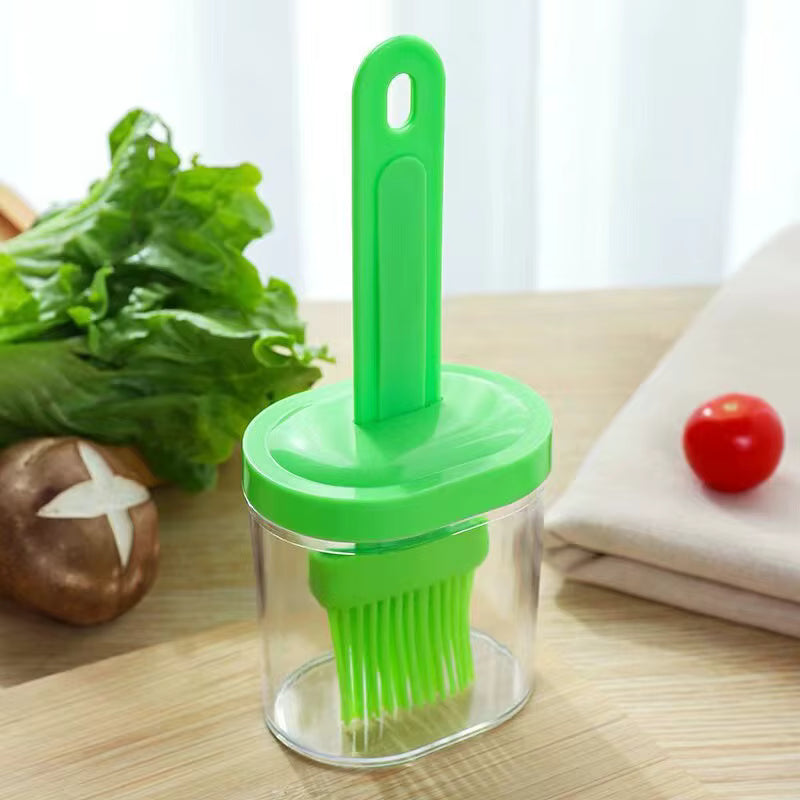 Free silicone oil brush bottle gift image in a kitchen setting, showing easy oil and sauce brushing for cooking, grilling, and baking.